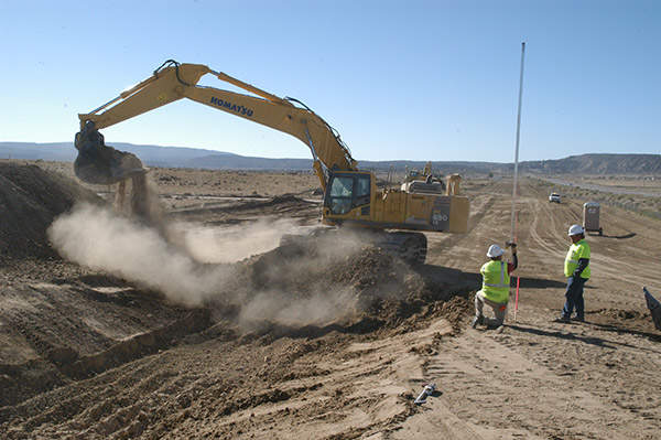 A Komatsu PC 650 LC trackhoe with a four cubic yard bucket is being used to mass excavate the pipe trench for the Navajo-Gallup water supply project. Images courtesy of US Bureau of Reclamation.