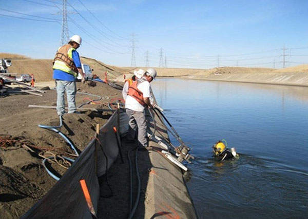 Construction work consisted of removing part of the concrete liner on both the DMC and CA. Image courtesy of US Bureau of Reclamation.