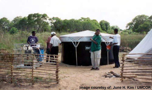 Water purification unit and storage tank. Small transportable systems such as this have proven invaluable in Mozambique.