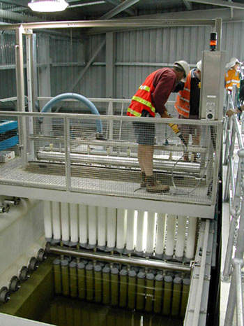 Membrane elements being installed. The Kwinana plant benefits from the major developments which have been made in microfiltration / RO dual membrane approaches for water reclamation over recent years.